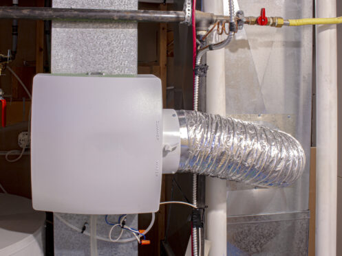 A whole-home humidifier attached to the duct system